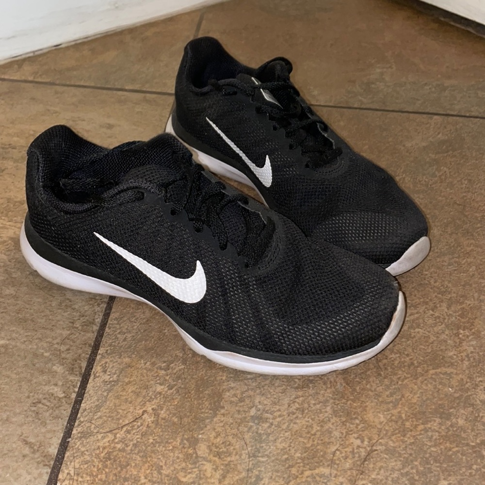 Women’s black Nike running shoes